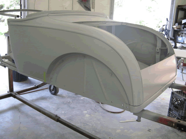 With all the dents removed, the body is in primer awaiting to be block-sanded multiple times.